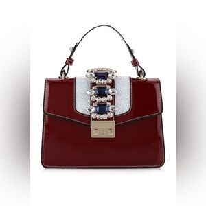 Izzy K All Decked Up Cherry Red Handbag EUC LNC